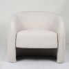 v637 e534021 202603021110 00.jpg Modern cream upholstered armchair against plain wall