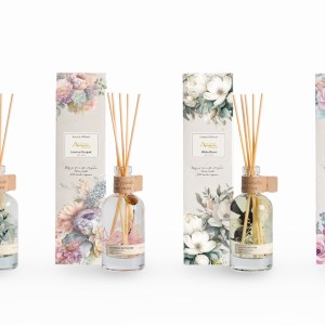 Floral reed diffusers with decorative botanical packaging