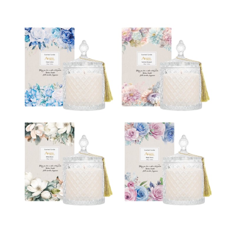 Floral scented candles in decorative glass jars