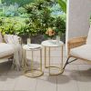 Gold round side tables on garden patio