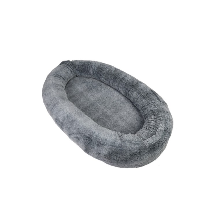 Grey plush oval pet bed on white background