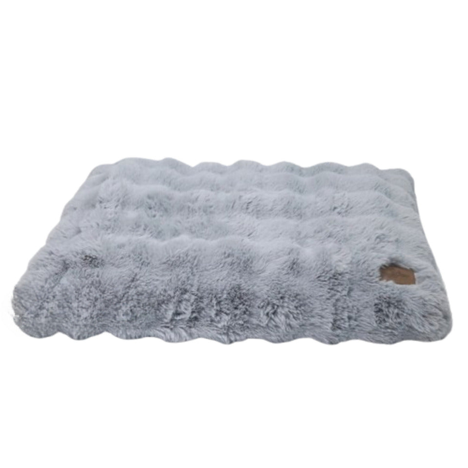 Grey fluffy faux fur rectangular rug