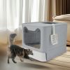 stainless steel enclosed cat litter box top exit pet toilet box w/ litter scoop Cat approaching covered litter box indoors