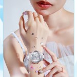 women's butterfly quartz watch with ceramic steel strap and luminous hands (silver shell white surface steel belt) Woman wearing silver butterfly watch close-up
