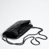 Black quilted leather handbag with chain strap
