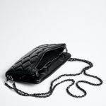 Black quilted leather handbag with chain strap