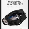 Black duffel bag packed with travel essentials