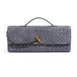 v888 elosung41396 202512091015 00.jpg Grey woven leather clutch with gold clasp