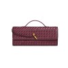 v888 elosung41401 202512091016 00.jpg Burgundy woven leather clutch with gold clasp