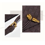 Brown woven leather bag with gold hardware detail