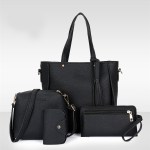 Black leather handbag set with matching accessories