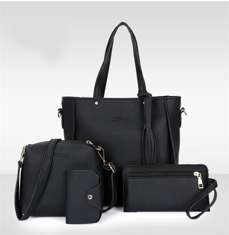 Black leather handbag set with matching accessories