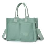 Mint green canvas tote bag with shoulder strap