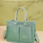 Mint green tote bag with front pockets