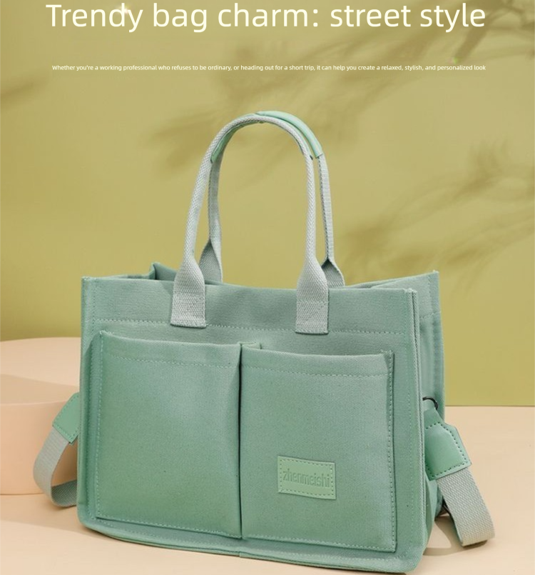 Mint green tote bag with front pockets
