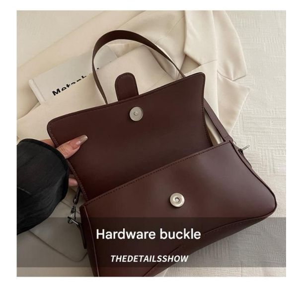 black fashion retro crossbody bag french chic small shoulder bag women’s baguette underarm bag Brown leather handbag with hardware buckle detail