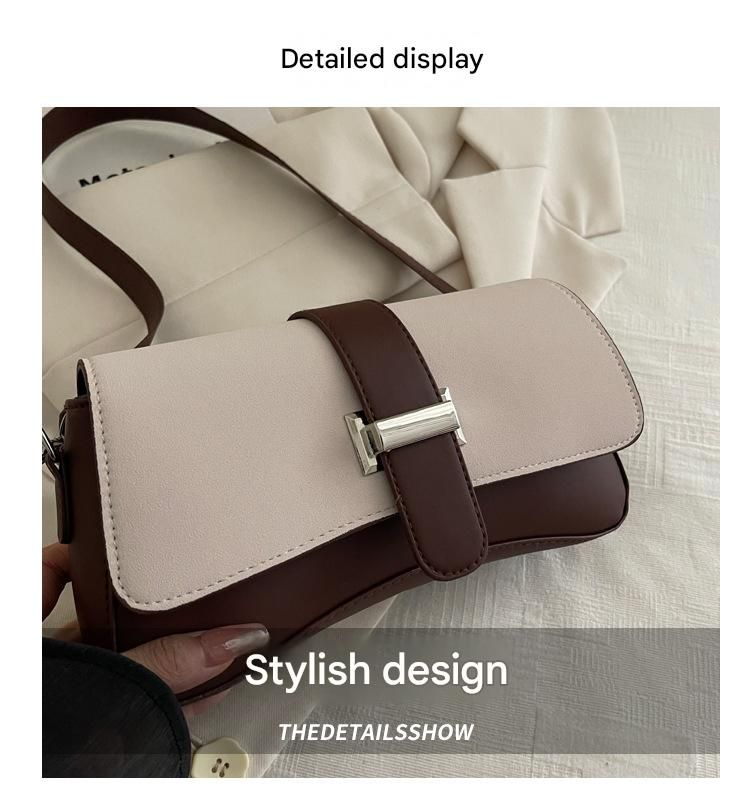 Two-tone brown and beige leather handbag