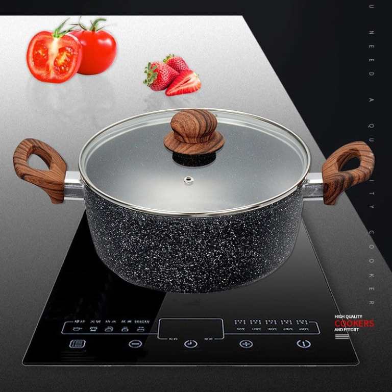 Speckled cooking pot on induction cooktop