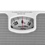 Close-up of analogue bathroom scale with zero instruction