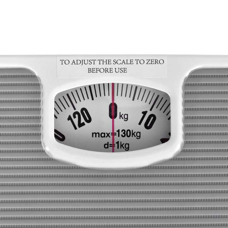 Close-up of analogue bathroom scale with zero instruction