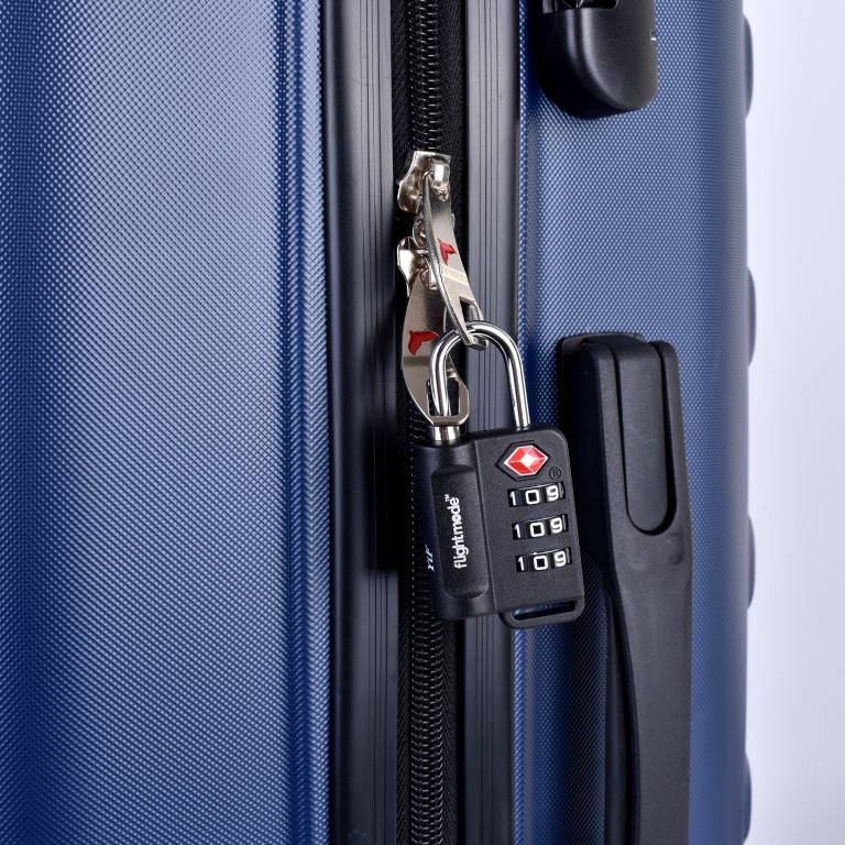 Close-up of suitcase with TSA combination padlock
