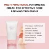 skin1004 madagascar centella poremizing light gel cream 2.53 fl.oz (75ml) Multi-functional pore refining cream on pink background