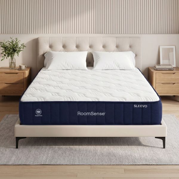 Modern bedroom with RoomSense mattress and wooden bedside tables