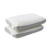 Two white contoured memory foam pillows stacked