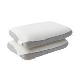 Two white contoured memory foam pillows stacked